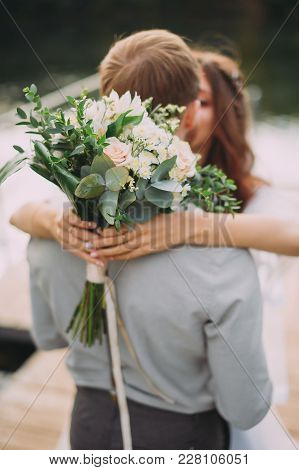 Stylish Bride And Groom Posing On The Background Of The River