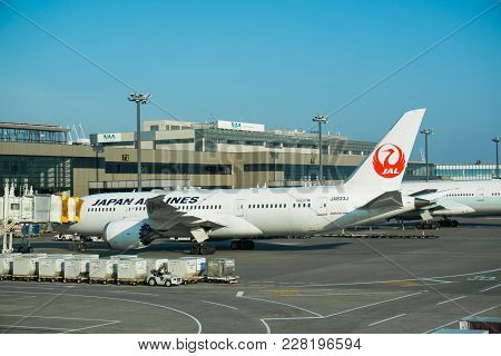 Narita, Japan 6 Aprill 2017 Japan Airline aircraft docking at Tokyo NArita Airport.  Narita is a hub