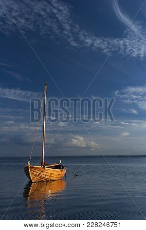 A Classic Wooden Sailing Boat In The Port
