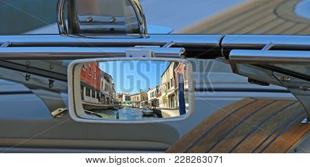 Rearview Mirror Of The Boat In The Canal Of An Island