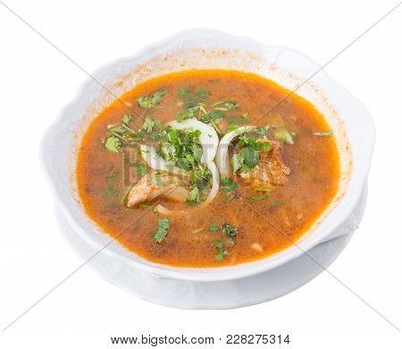 Georgian Kharcho Beef Soup With Onions And Tomatoes. Isolated On A White Background.