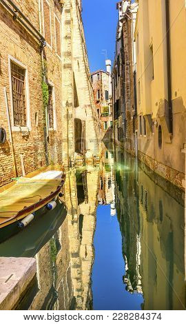 Boat Colorful Small Canal Buildings Reflectiions Venice Italy