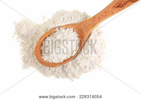 Pile Of Flour In Wooden Spoon Isolated On White Background. Top View. Flat Lay.
