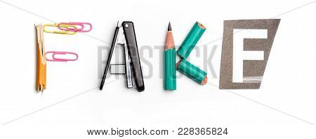 Concept Of Idea With Colorful Crumpled Paper. The Word Fake Created From Office Stationery. The Art,