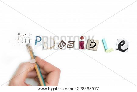 Concept Of Idea With Colorful Crumpled Paper. The Word Impossible Created From Office Stationery. Th