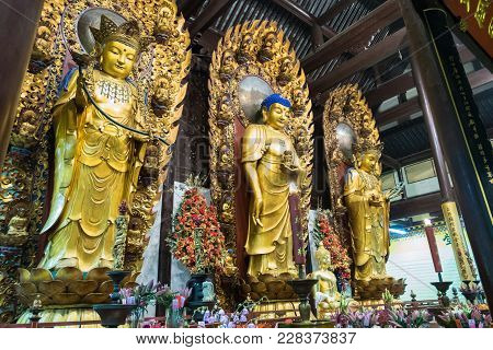 Buddhist God Statue In The Ancient Longhua Temple. China, Shanghai.