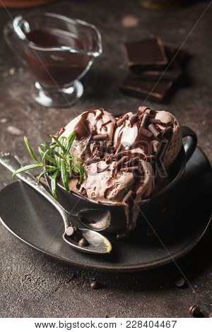 Chocolate Coffee Ice Cream Balls In A Bowl Over Dark Background