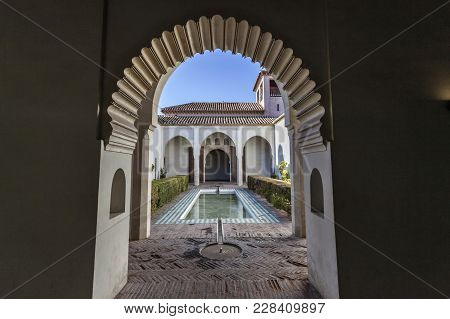 Malaga, Spain- January 22,2018: Historic Monument, La Alcazaba,palatial Fortification.courtyard Gard