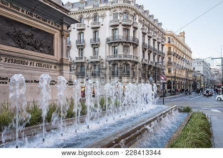 Granada, Spain- January 15, 2018: City Center, Fountain Square,plaza Isabel La Catolica In Granada, 