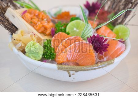 Sashimi With Mixed Sliced Fish Sashimi On Ice In With Bowl.