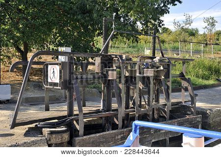 Passage Of A Lock To Fonserannes On The Canal Du Midi Near Beziers By A Cruise Ship