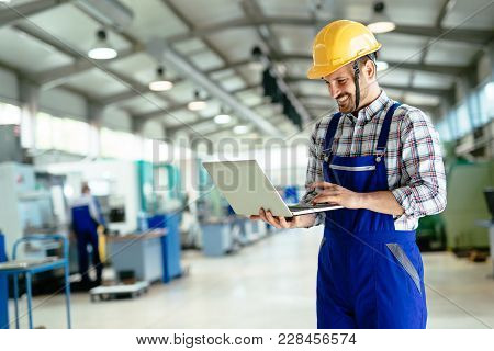 Technician Working Inmetal Industry Factory And Doing Quality Control