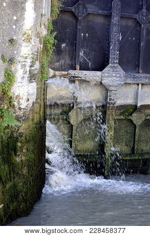 Passage Of A Lock To Fonserannes On The Canal Du Midi Near Beziers By A Cruise Ship