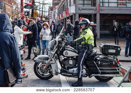 Vancouver, Canada - February 18, 2018: Vancouver Police Department Motocycle Officers At Chinese New