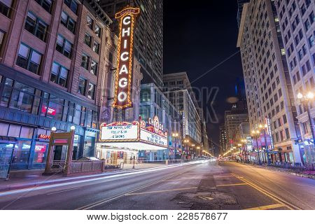 Chicago, Il - February 18, 2018: Famous Chicago Theatre Neon Sign And Night Street Scene.