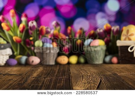 Easter Theme. Easter Eggs. Colorful Tulips. Rustic Wooden Table. Shallow Depth Of Focus. Bokeh Backg