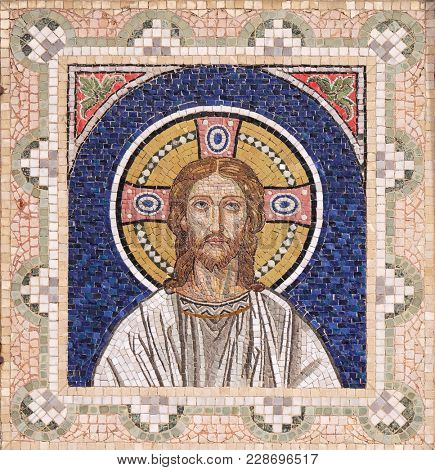 ZAGREB, CROATIA - APRIL 12: Jesus Christ, mosaic on house facade in Zagreb, Croatia on April 12, 2015.