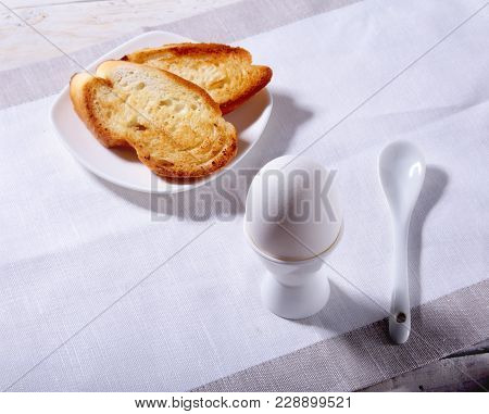 Healthy Morning Breakfast Set With Egg, Orange Jam On Bread Toast And Milk In Glass