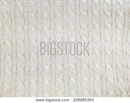Close Up Of Cream Colored Cable Knit Pattern Background