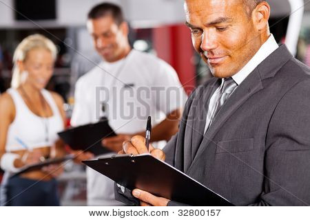 closeup of male gym manager