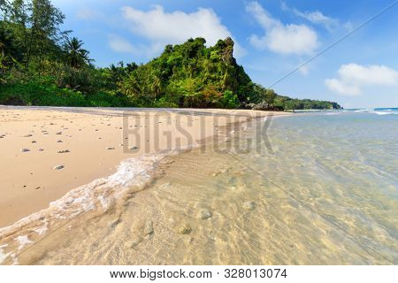 Deserted tropical beach with clear water in Chumpon, Thailand