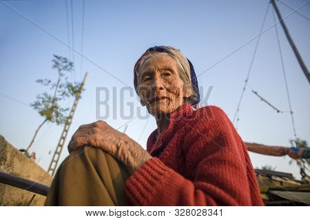 Hoi An, Quang Nam Province, Vietnam -  February 24, 2011: Senior Vietnamese Woman With Striking Faci