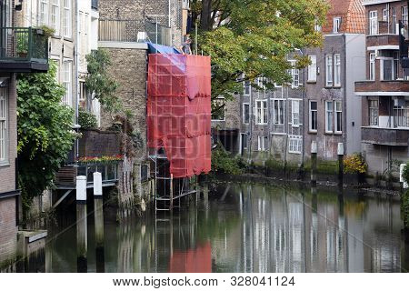 Scaffolding For Renovation Of A Canal House In Dordrecht In The Netherlands