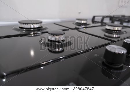 Fragment Of A Gas Kitchen Stove. Fragment Of A Gas Kitchen Stove. Clean Gas Stove Closeup