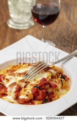 Italian Tagliatella Pasta With Tomato Sauce And Wine