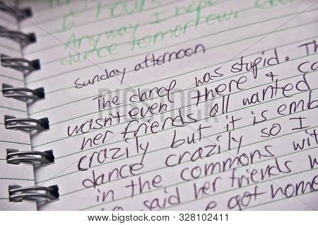 Handwritten Diary Entry In A Notebook By A Teenager