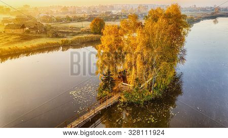 Morning Landscape, Wooden Hunting Lodge, On A Small Man-made Island. A Wooden Platform Is Coming To 
