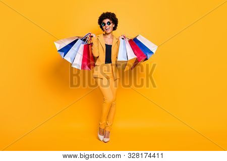 Full Length Photo Of Positive Bruntte Hair Dark Skin Girl Feel Enthusiastic Hold Bags Addicted Shopp