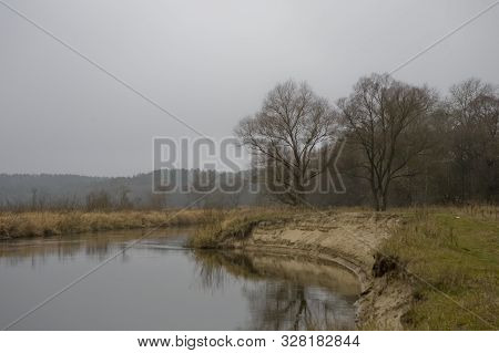Beautiful Polish Autumn Cold Gray Cloudy November Landscape Of Podlasie With The River Bug