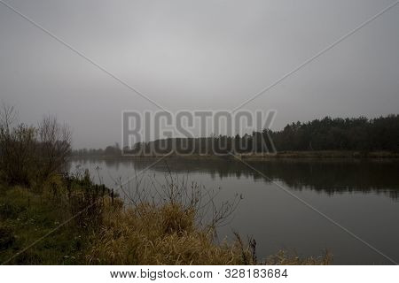 Beautiful Polish Autumn Cold Gray Cloudy November Landscape Of Podlasie With The River Bug