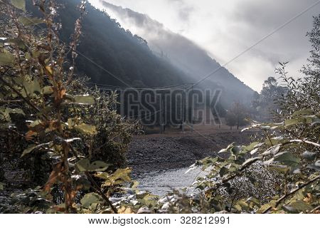 Autumn Scene With Dramatic Light On The Olt River