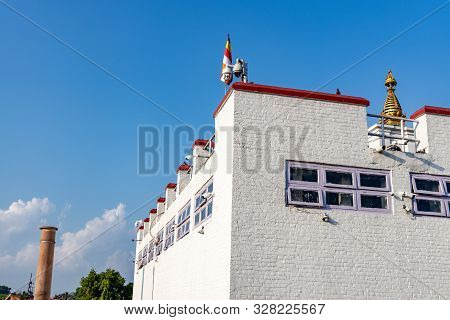 Holy Maya Devi Temple And Ashoka Pillar In Lumbini.