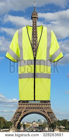 Very Big Yellow Jacket Symbol Of Yellow Vests Movement On Eiffel Tower In Paris France. This Is A Ph