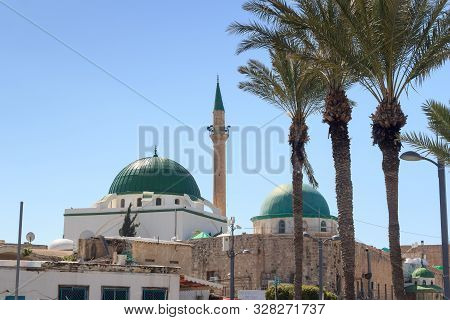 Acre, Israel - March 18, 2019: El-jazzar Mosque (white Mosque) With Dome, Minaret And Palm Trees In 