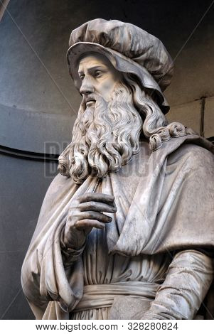 FLORENCE, ITALY - JANUARY 11, 2019: Leonardo da Vinci, statue in the Niches of the Uffizi Colonnade in Florence, Italy