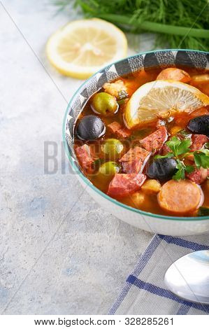 Traditional Soup Hodgepodge In Plate On White Table Copyspace