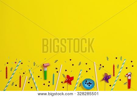 Bithday Party Decorations On Yellow Background, Top View