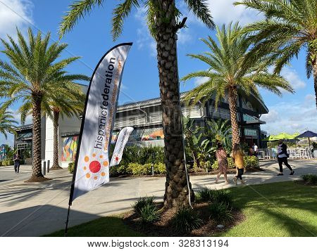 Orlando,fl/usa-10/16/19: A Hispanic Federation Flags Flying Outside A Meeting Venue.  The Mission Hi