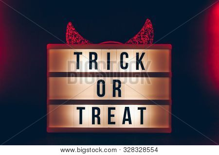 Halloween Themed Cinema Light Box On The Dark Toned Background With Red Heck Horns And Red Highlight