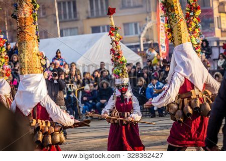 Mummers perform rituals to scare evil spirits at Surva festival at Pernik in Bulgaria. The people with the masks are called Kuker (kukeri).