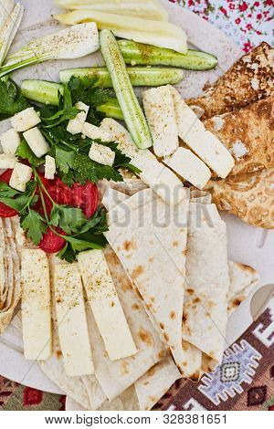 Pita Bread With Tomatoes, Cucumbers. Unleavened White Bread. National Cuisine Of The Peoples Of The 