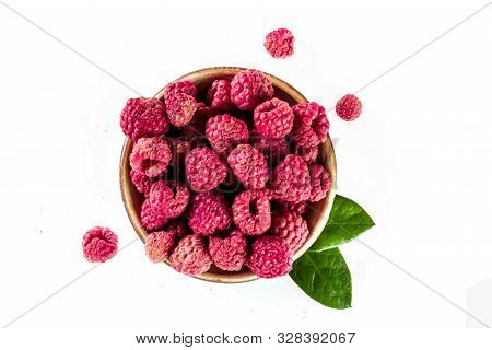 Heap Of Sun Dried Raspberries Isolated On White Background. Top View