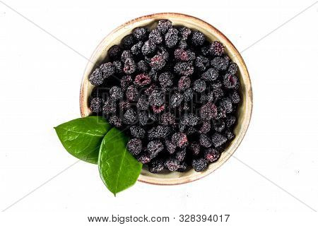 Heap Of Sun Dried Sweet Blackberries Isolated On White Background. Top View