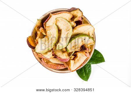 Heap Of Sun Dried Apple Slices Isolated On White Background. Top View