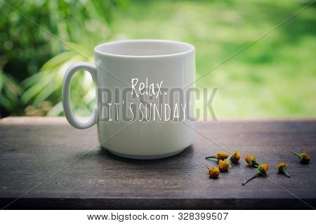 Sunday Mug Of Coffee Concept. Morning White Coffee With Text Notes On It - Relax. It Is Sunday. And 