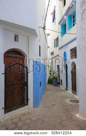 Narrow old street  in the medina of Assilah, Morocco
